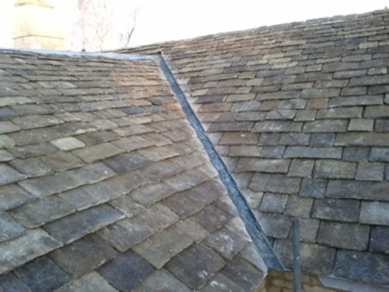 Completed grey slate pitched roof in Gloucestershire